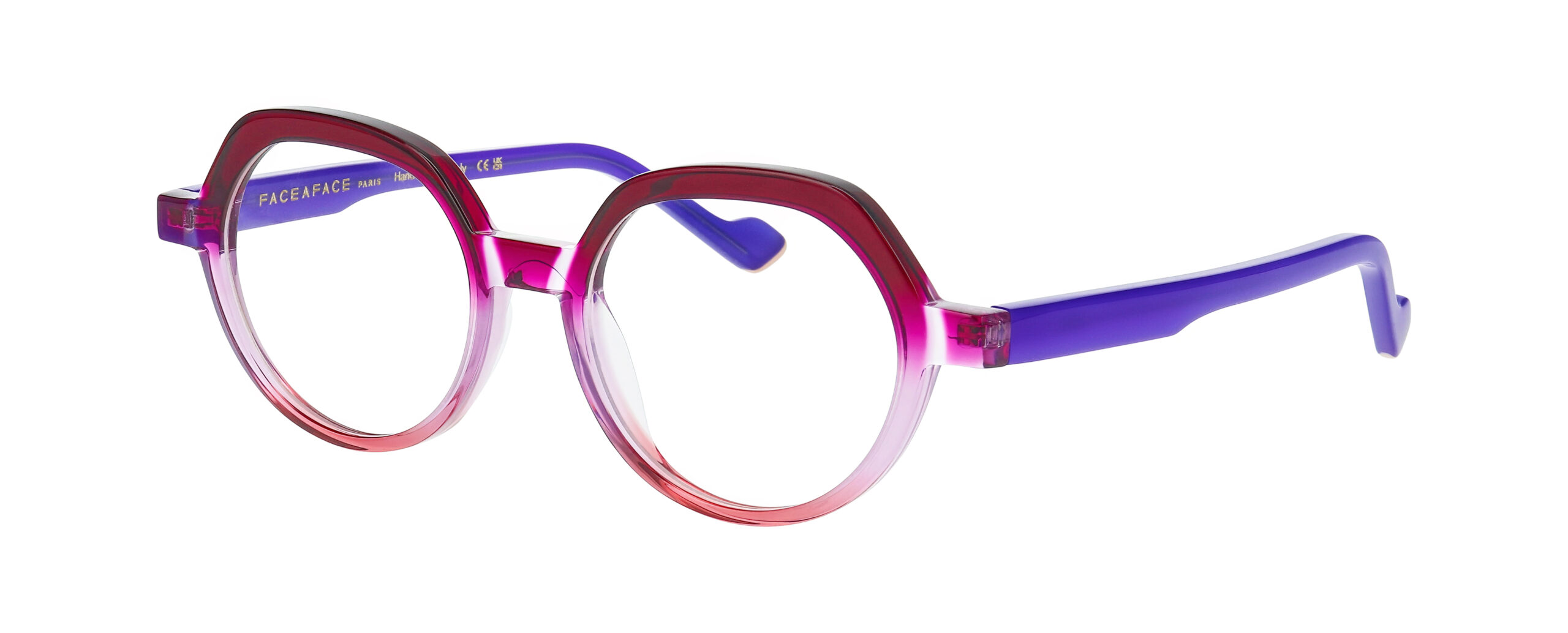 Lunettes de vue FACE A FACE PHOEBE 1 rose framboise et violet, monture ronde transparente aux branches violettes, chez The House of Eyewear Paris 1er.
